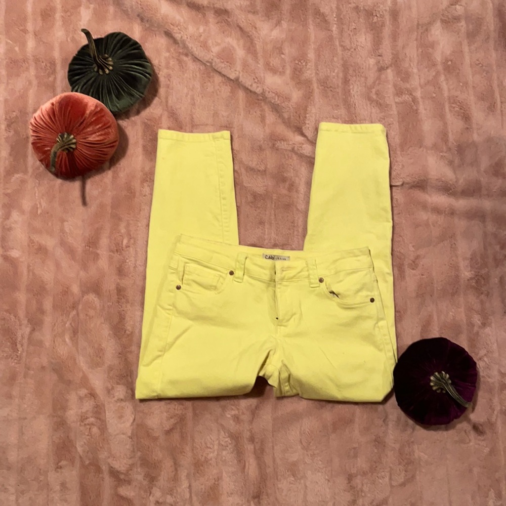 Bright yellow CAbi ankle jeans. There is slight discoloration. Please see pics